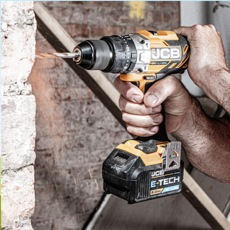 The JCB 18V 45Nm, Variable Speed Combi Drill  in use.